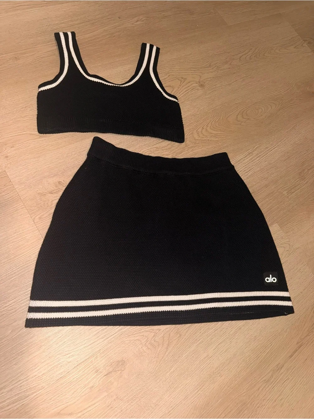 ALO Yoga Black Mini Skirt with White Stripe Detail